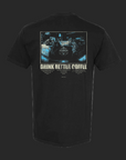 Black t-shirt with a graphic design and text on the back, displayed on a white background.